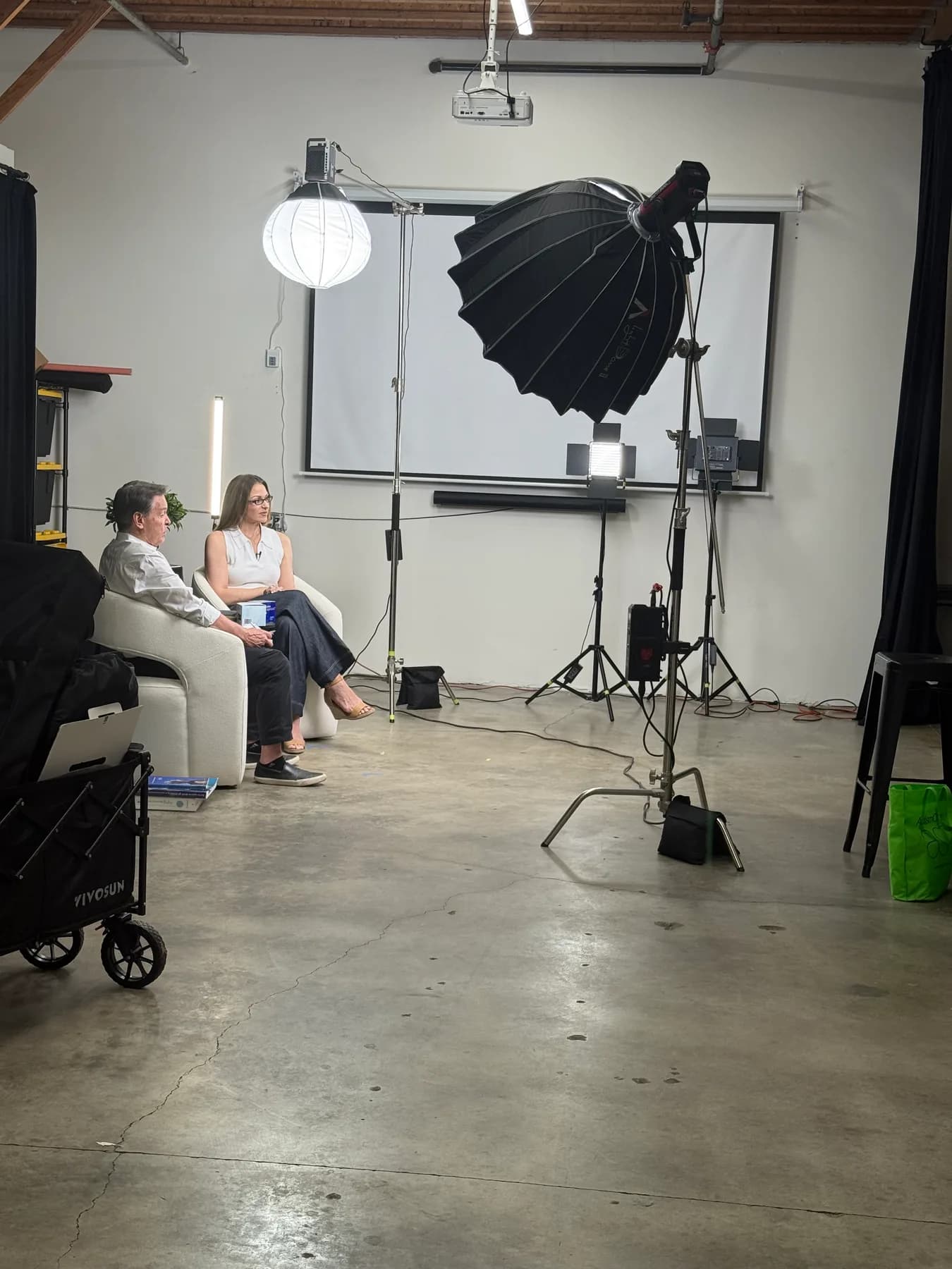 Two guests seated for an interview with studio lighting in Camarillo
