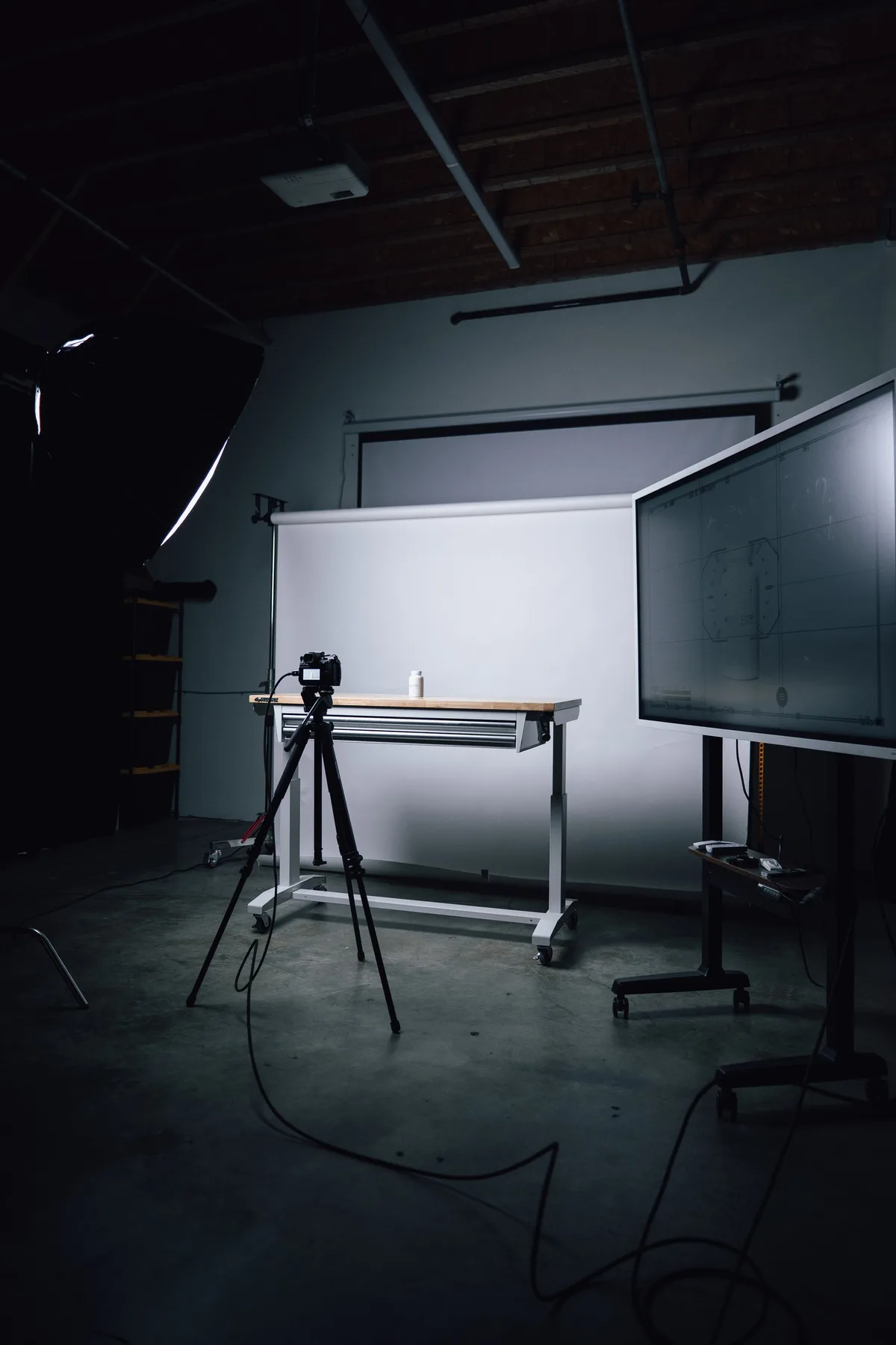 Product photography station with camera and lighting